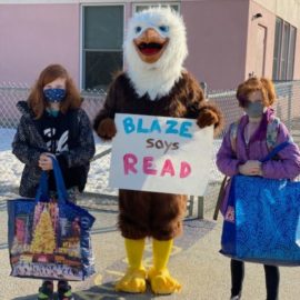 Featured image of article: Blaze greets students at AES