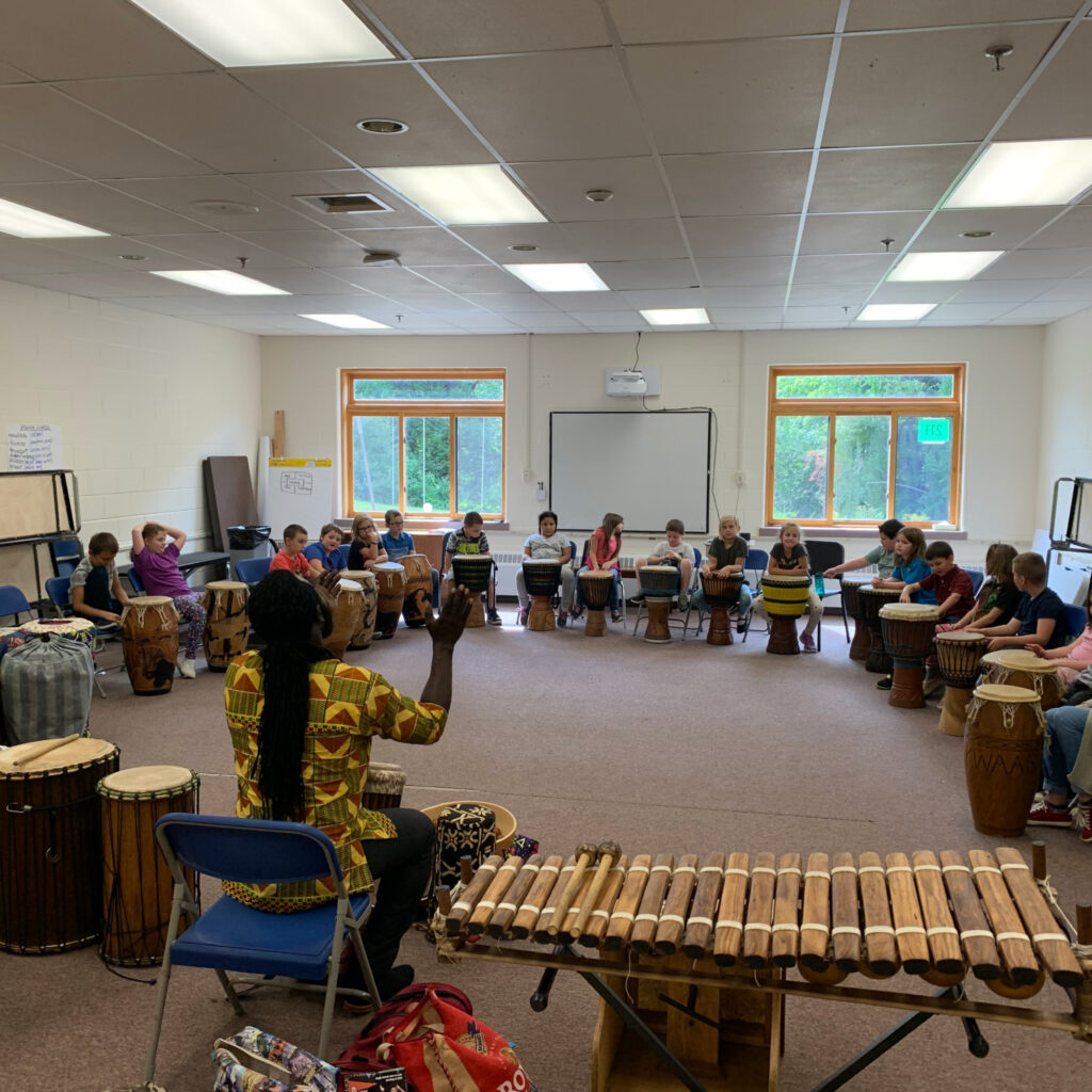 Featured image of article: AES 2nd Grade Learning the Art of Drumming