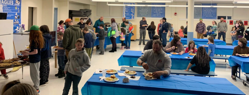 Featured image of article: AES Students and Families Enjoy Spaghetti Supper as part of Math Night