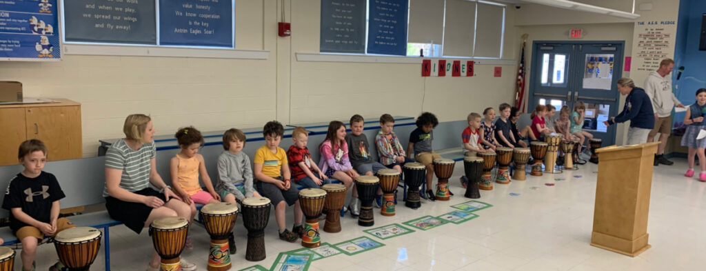 Featured image of article: Drumming at AES Community Meeting